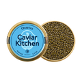 A closed tin of Caviar Kitchen Ossetra caviar beside an open tin of its roe.